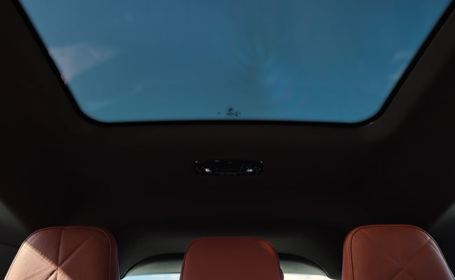 Upward angled view of BMW panoramic glass sunroof