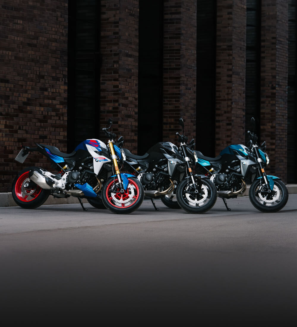 Front angled view of three BMW motorcycles