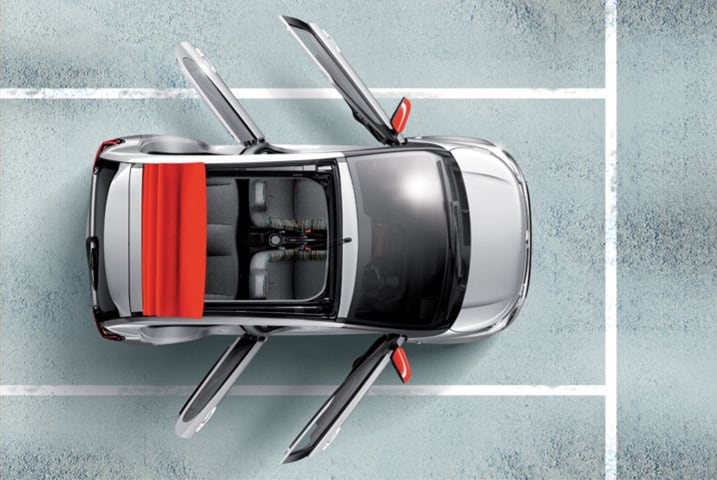 Top view of a silver Citroen C1 with the roof down