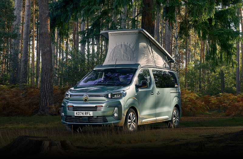 Front angled view of Citroën Holidays in woodland area