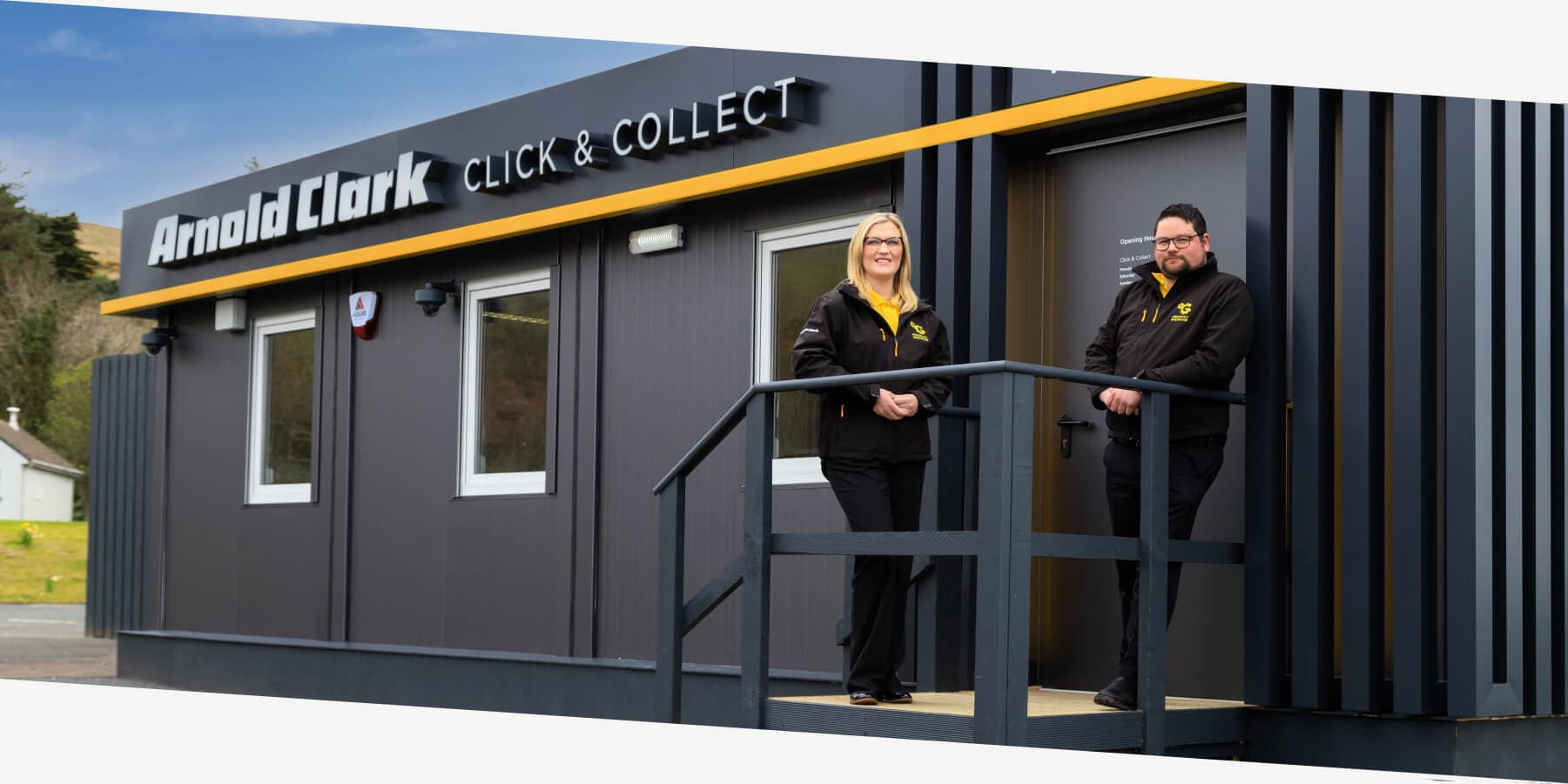 Product geniuses standing outside an Arnold Clark Click & Collect location