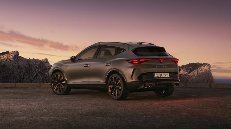 Front angled view of the Cupra vehicle in mountainous background
