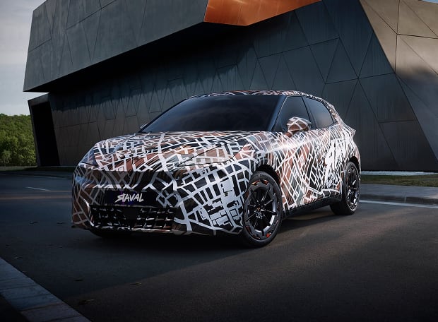 Front angled view of Cupra Raval outside building