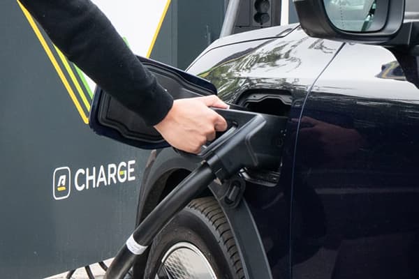 Arnold Clark Charge customer using chargering unit