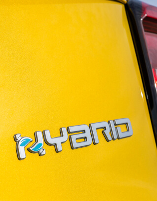 Close up rear view of Fiat 500 Hybrid badge and logo