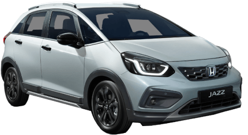 Angled front view of Premium Sunlight White Pearl Honda Jazz