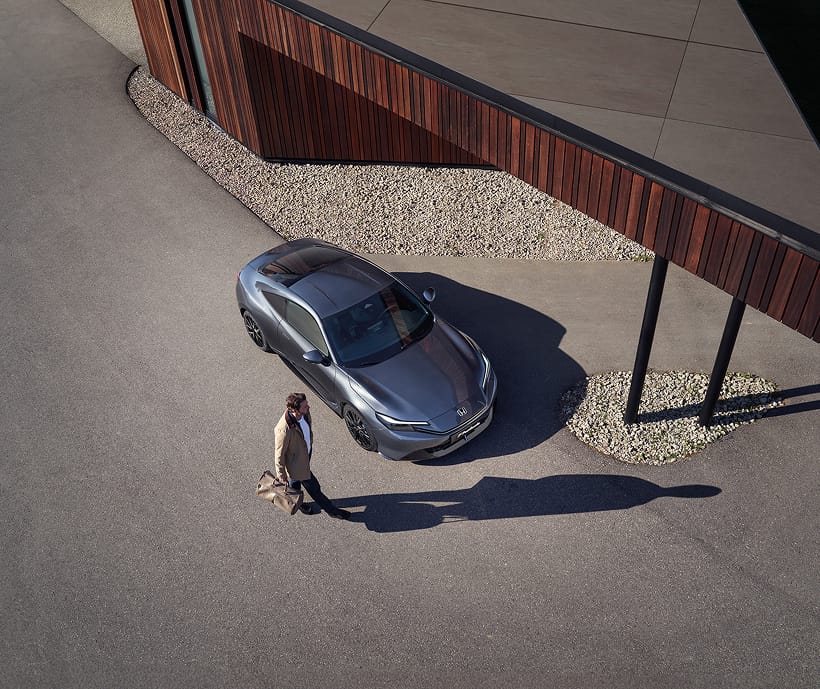 Top view of Honda Prelude parked infront of house