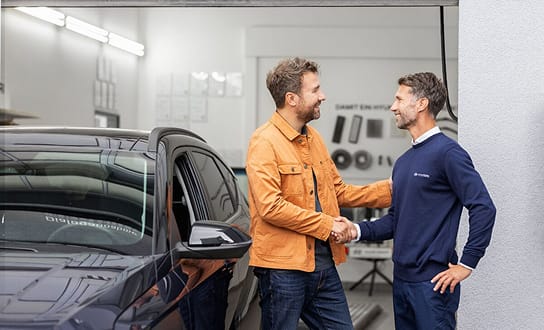 Front view of men shaking hands