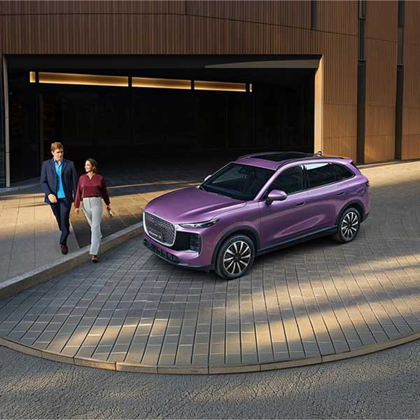 Two people walking out a modern city office past a purple Lepas L8