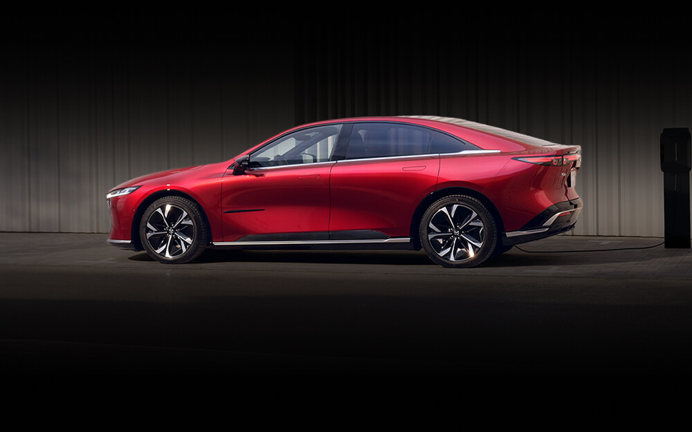 Side profile of Mazda6e in red