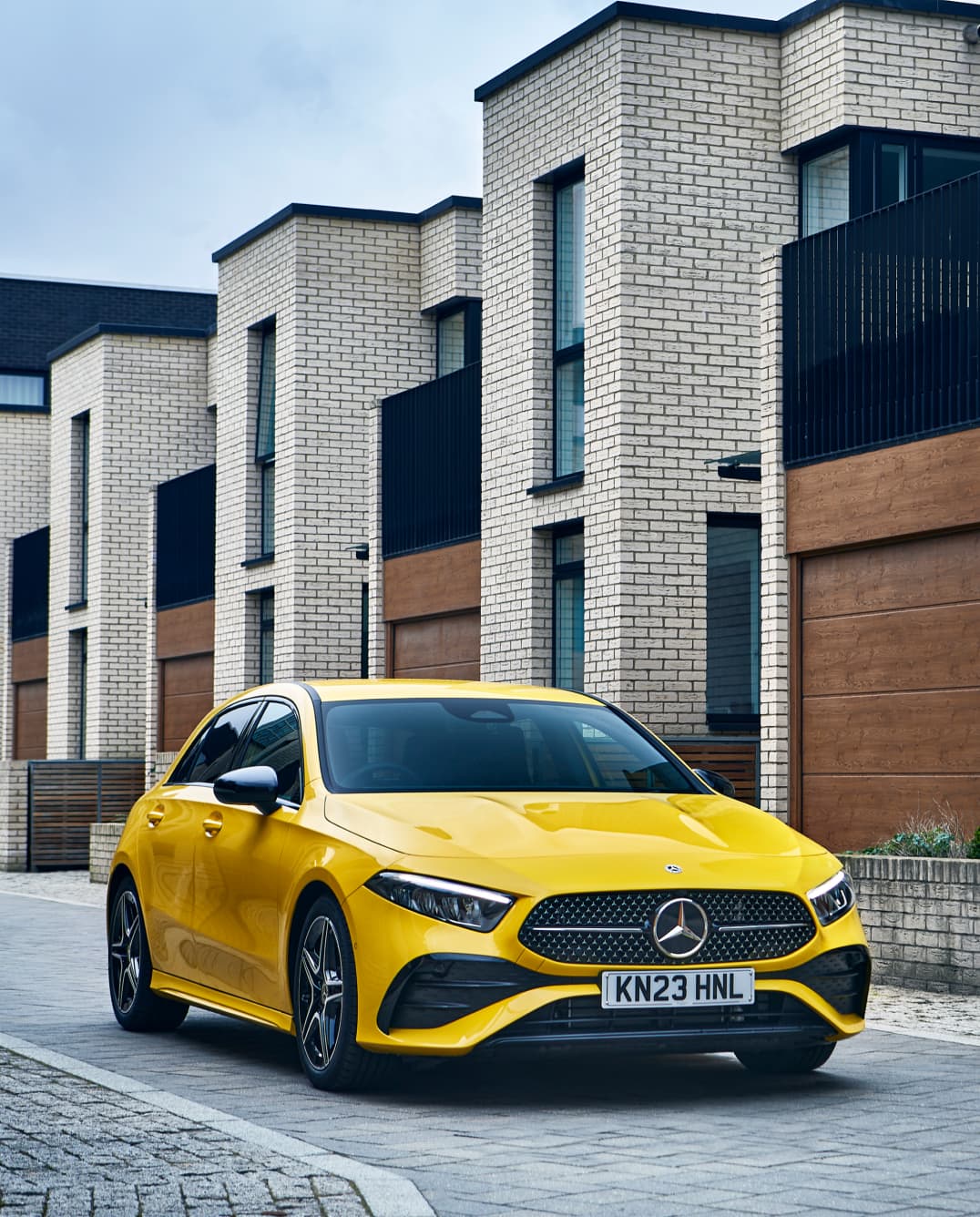 Angled front shot of yellow Mercedes-Benz A-Class Hatchback