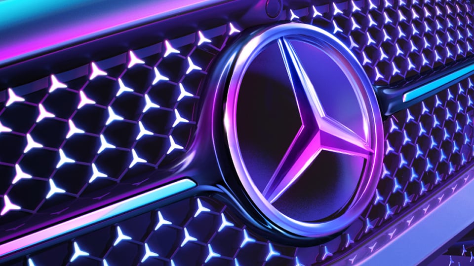 Close up view of Mercedes-Benz grille and logo