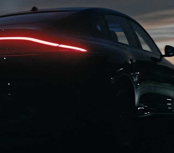 View of IM range car with rear brake lights on at night