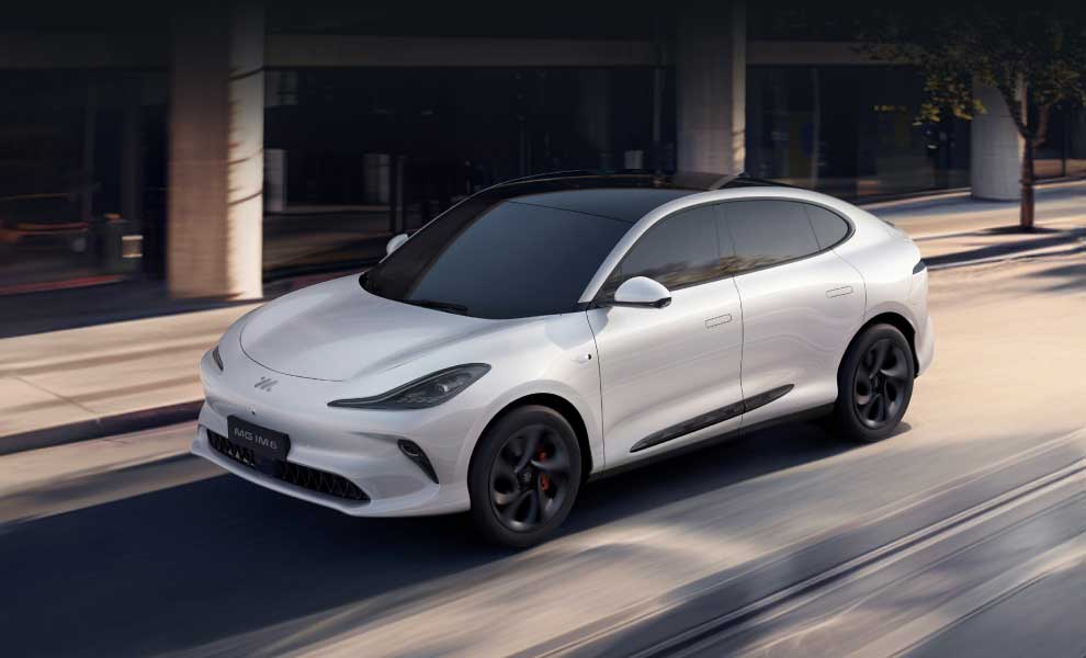 MG IM6 driving along a street