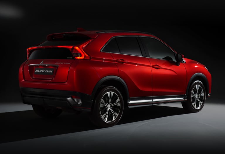 Red Mitsubishi Eclipse Cross rear three quarter