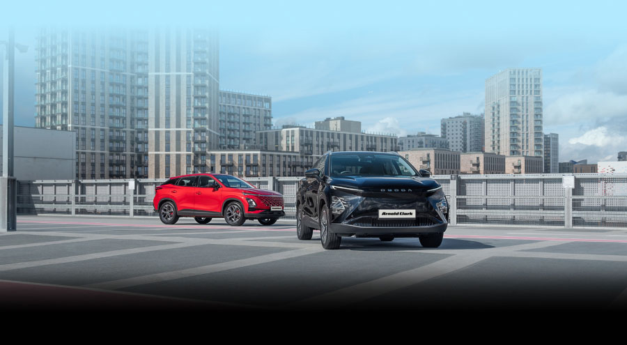 OMODA 5 and E5 parked in at the top of a multi-storey car park in the city