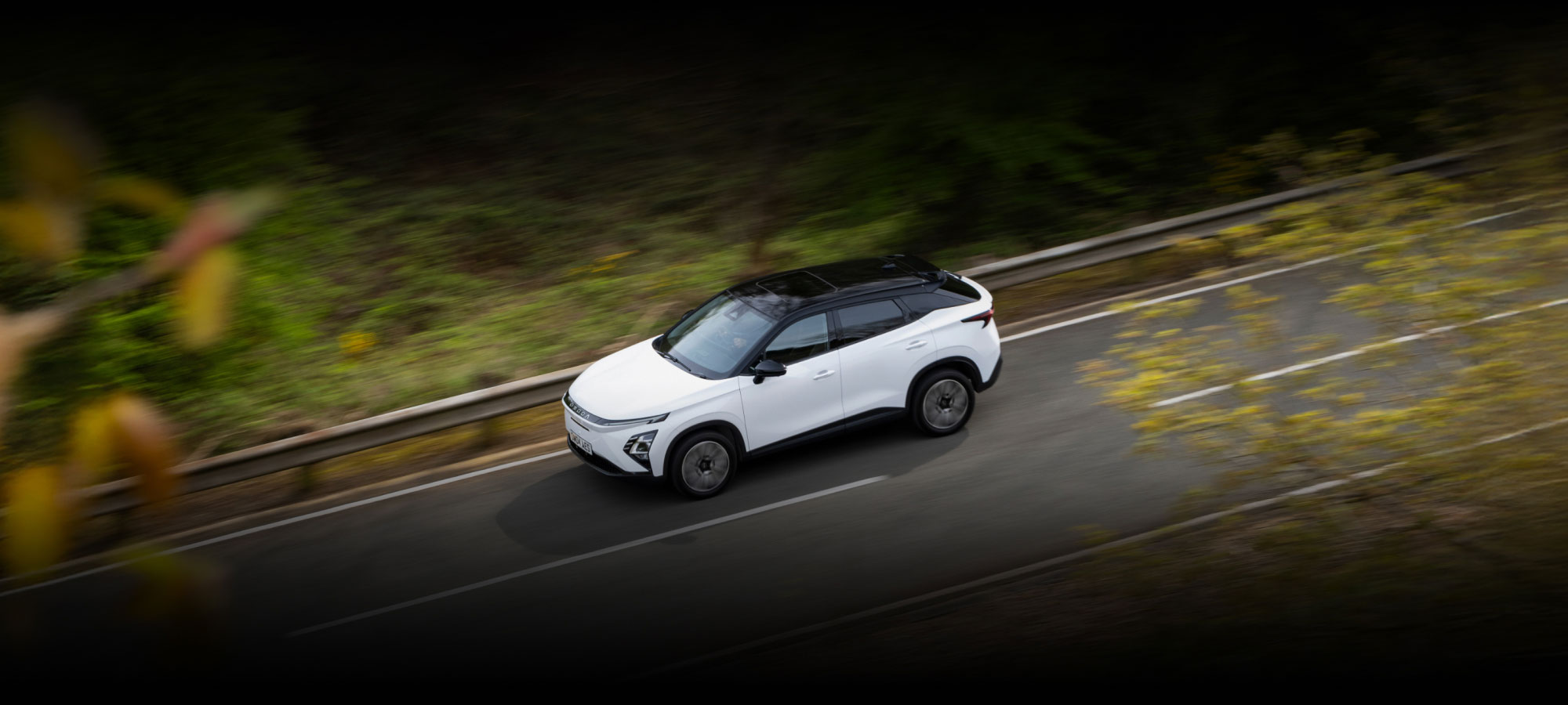 OMODA E5 traveling along country road