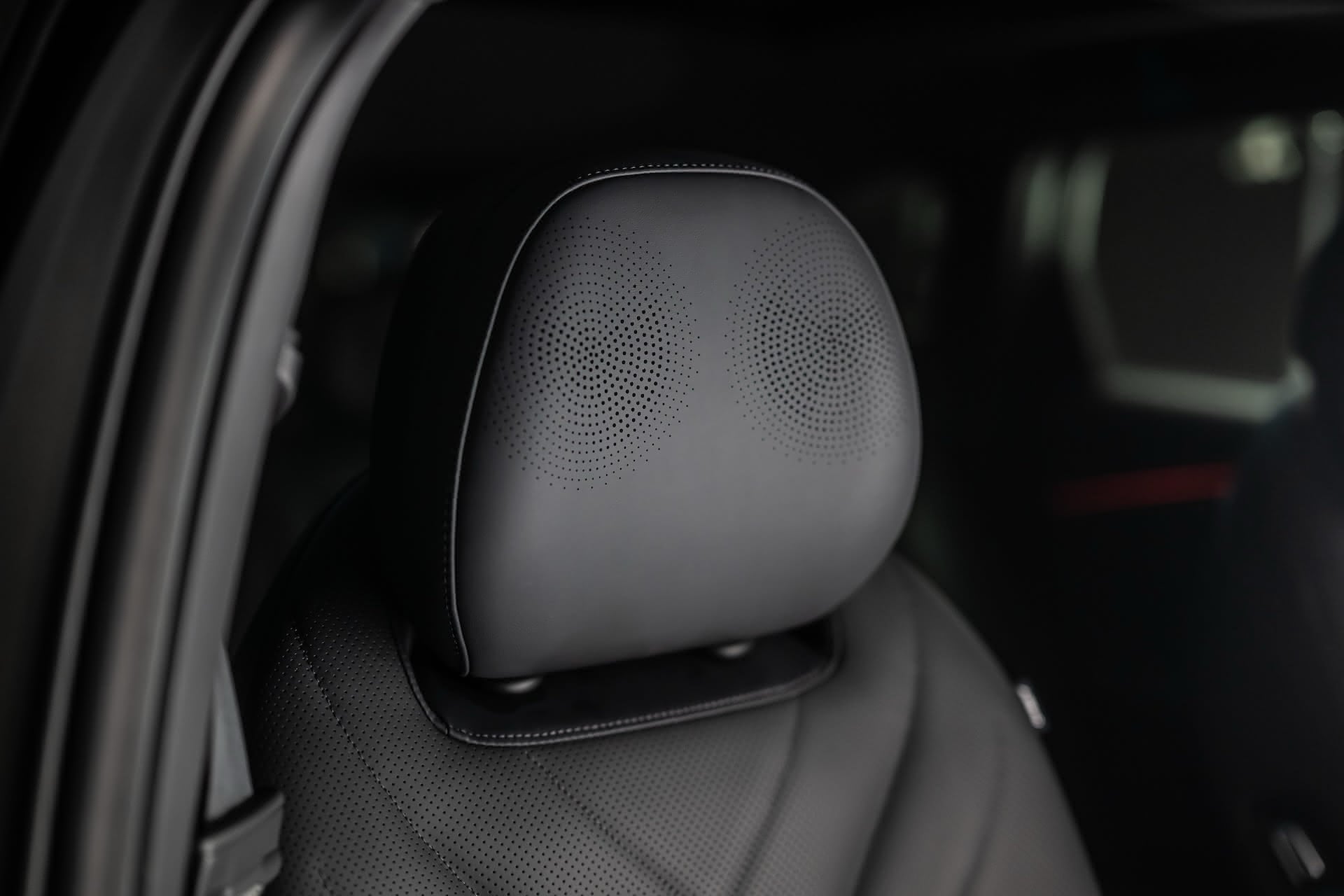 Sony Speakers integrated into the headrest of an Omoda 9