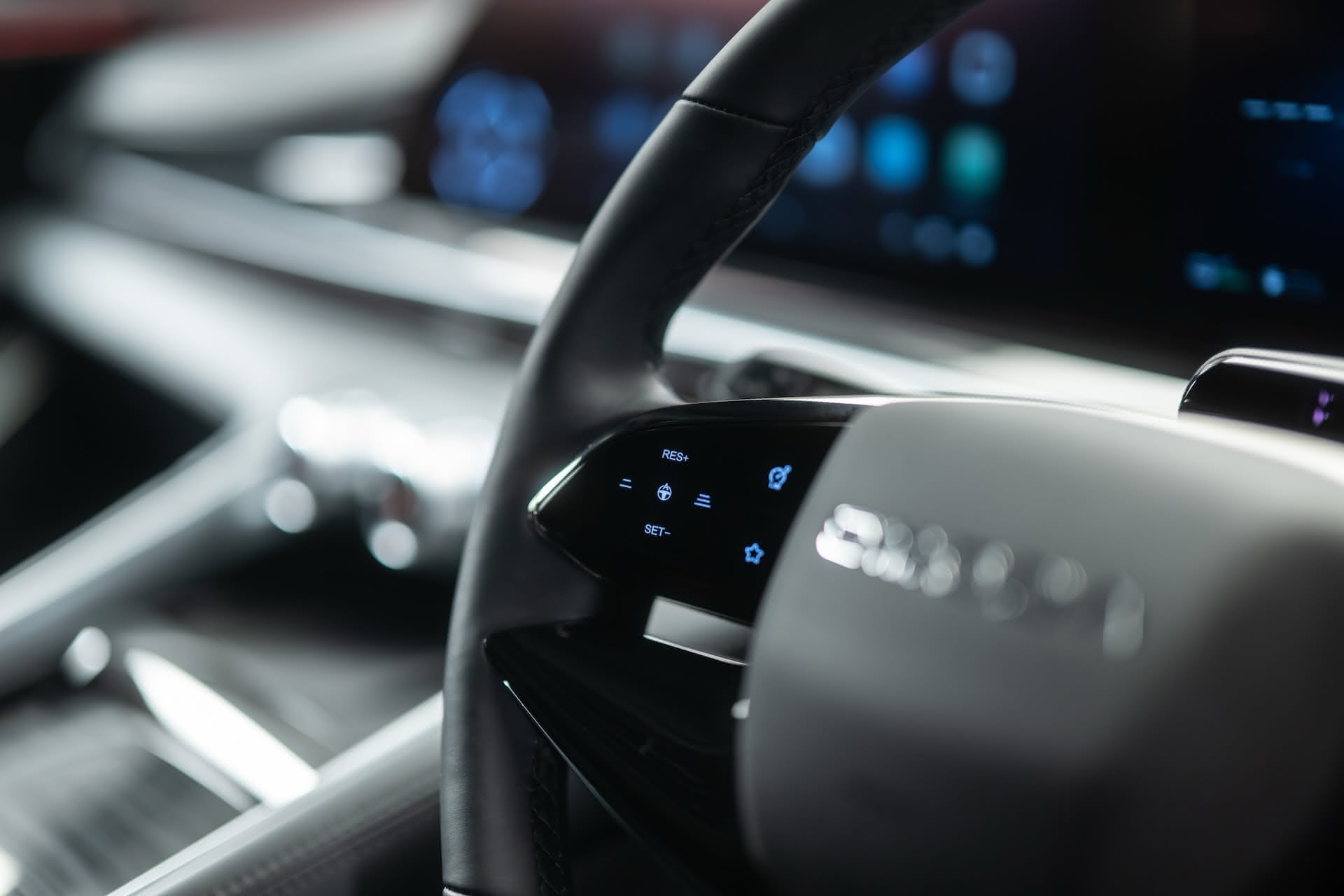 A close up of the steering wheel in an Omoda 9