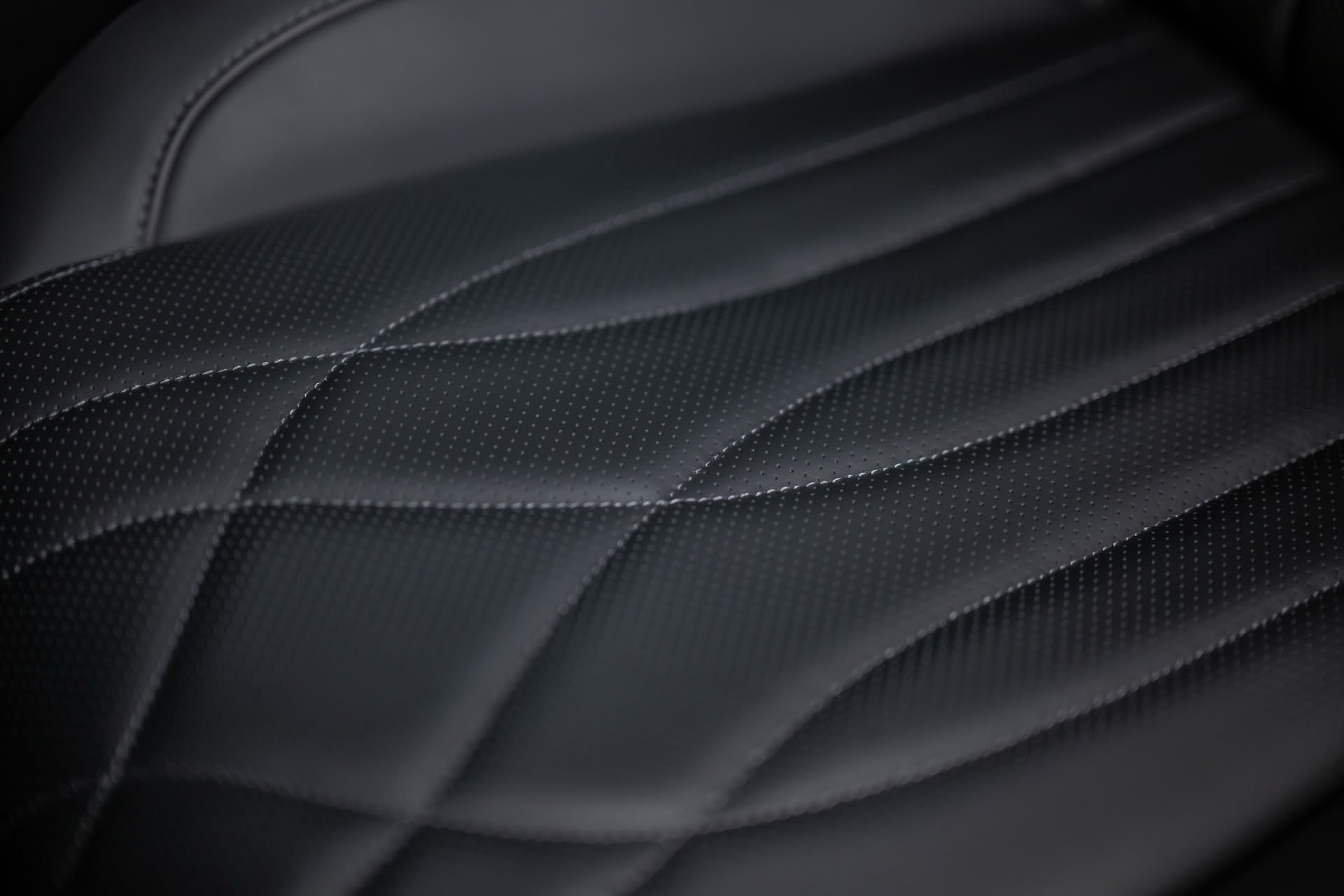 Seat upholstery showing premium materials in Omoda 9