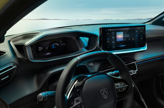 Close up interior view of Peugeot 208 steering wheel and dashboard