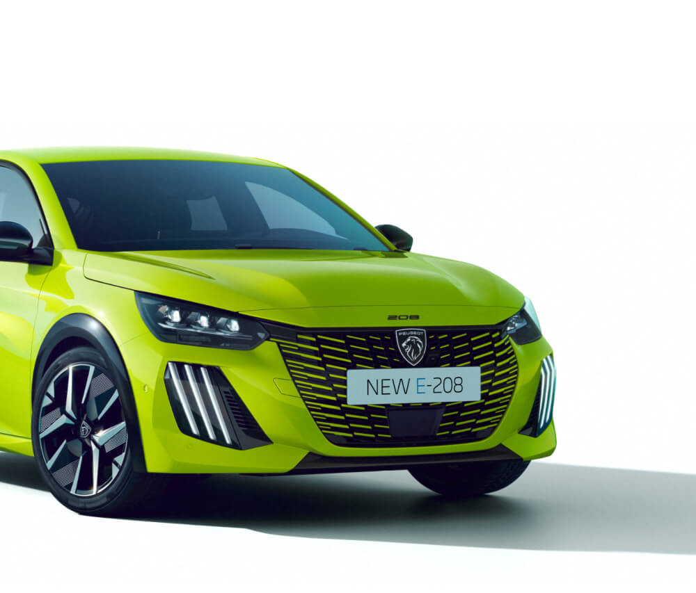 Front angled view of green Peugeot 208
