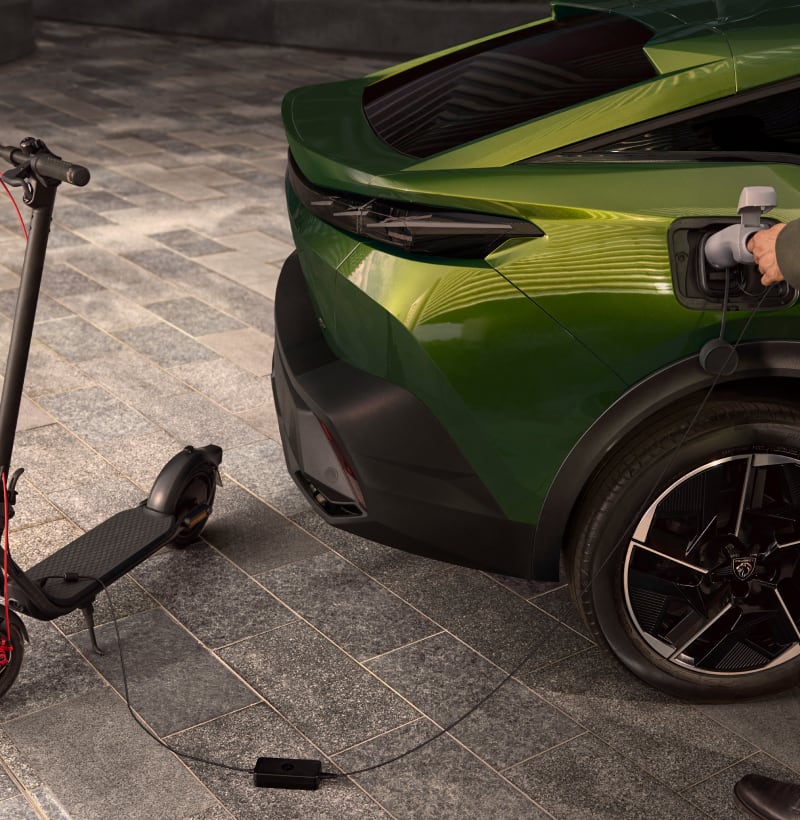 Peugeot 408 close up charging charging scooter