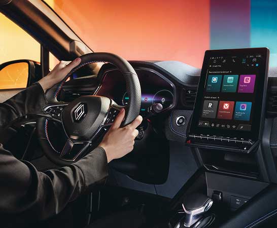 Close up of man holding Renault Captur steering wheel