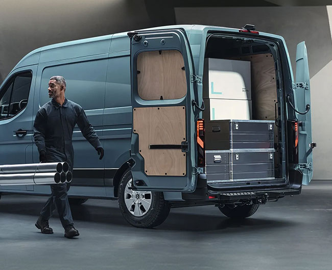 Renault van with back doors open showing wood lining