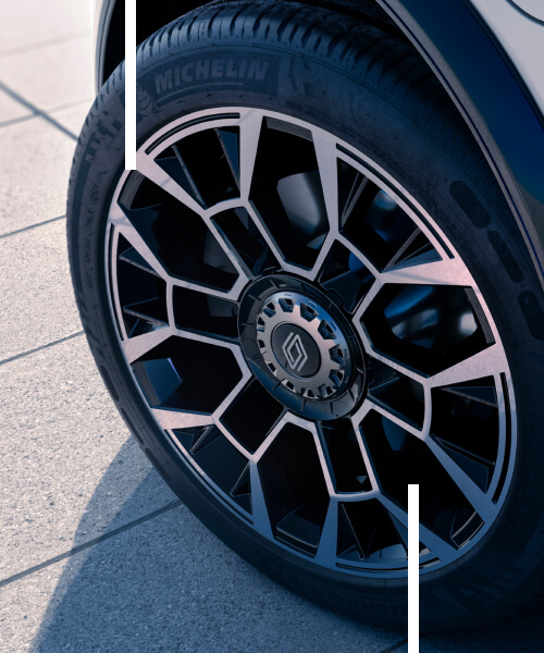 Close up view of Renault 5 Roland Garros alloy wheels