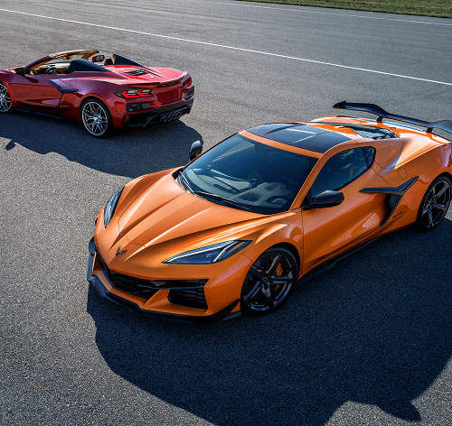 Two Corvettes parked on a road