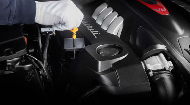 Maserati engine being worked on my mechanic