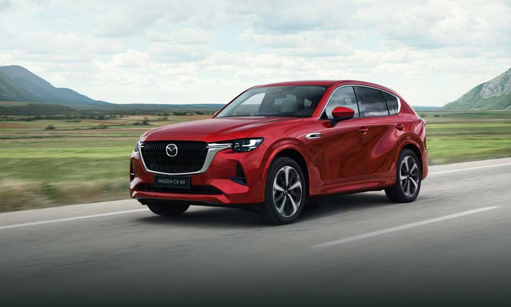 Mazda CX-60 travelling along road
