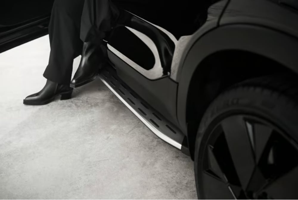 View of passenger steping out with running boards in view