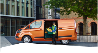 Image of a man unloading an orange van