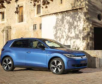 Front side view of blue Volkswagenn ID. Polo in mediterranean village