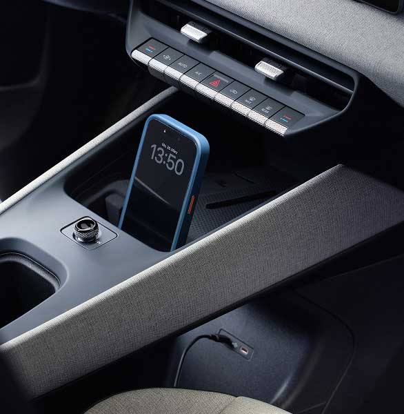 Close up of mobile phone charging doc of Volkswagen ID. Polo