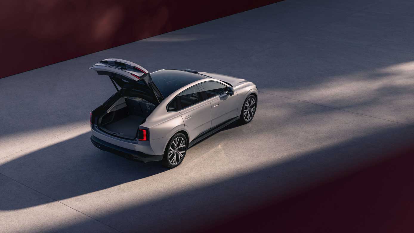 Volvo ES90 rear side view with boot open