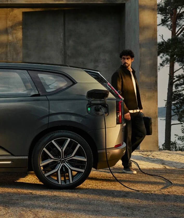 Rear view of Volvo EX60 charging